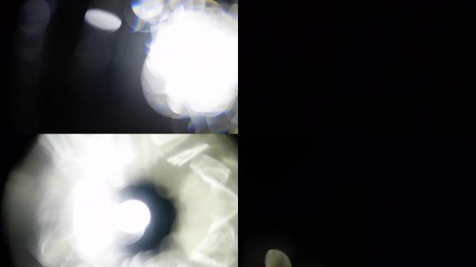 4k的漏光镜头。抽象的Bokeh白光移动的慢动作长镜头。