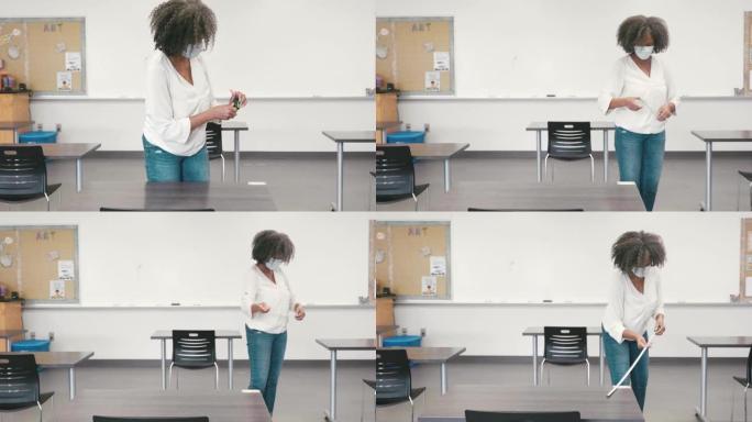 新型冠状病毒肺炎期间，女校教师在每张桌子之间测量6英尺