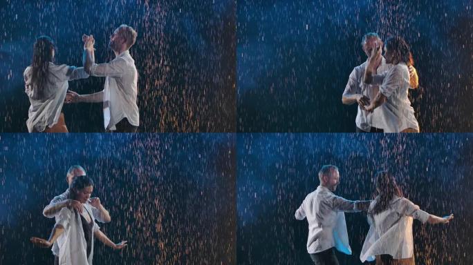 在闪烁的雨滴和演播室的灯光下，激情的情侣跳萨尔萨舞。一种能拉近身体距离的舞蹈。缓慢的运动。近距离