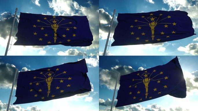 印地安那州的旗杆在风中飘扬，背景是蓝天。4 k