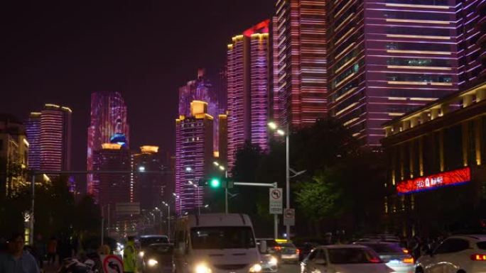 著名的夜间照明秀青岛市现代市中心交通街道全景4k中国