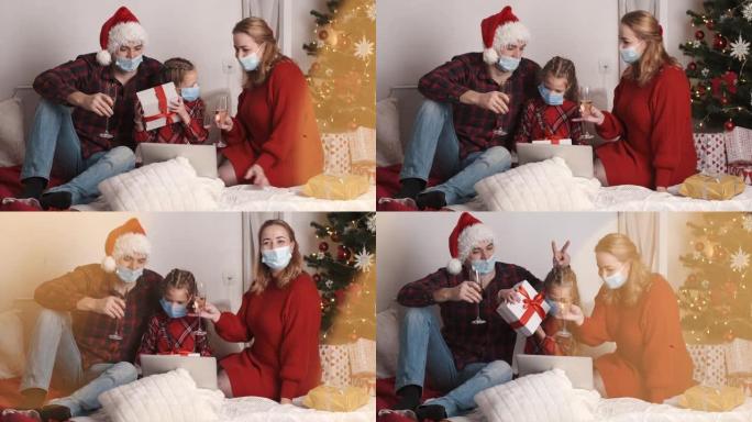 新年前夕，戴着面具的快乐高加索家庭一起坐在圣诞节发光树附近的装饰房屋中