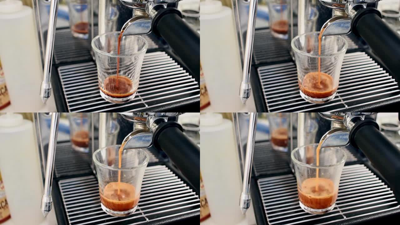 咖啡机将咖啡液倒入玻璃杯中