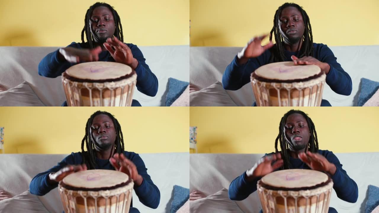 非洲人演奏音乐节奏鼓。实现放松心理乐器
