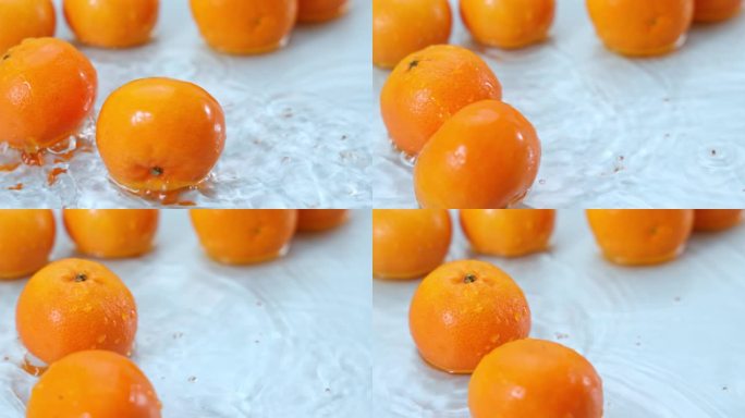 4K超清水中橙子碰撞的慢镜头