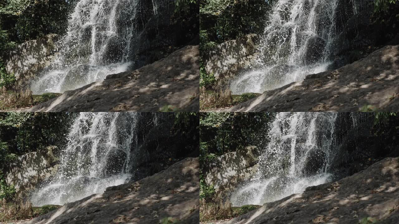 瀑布多山，美丽的瀑布倾泻在岩石和岩石上。