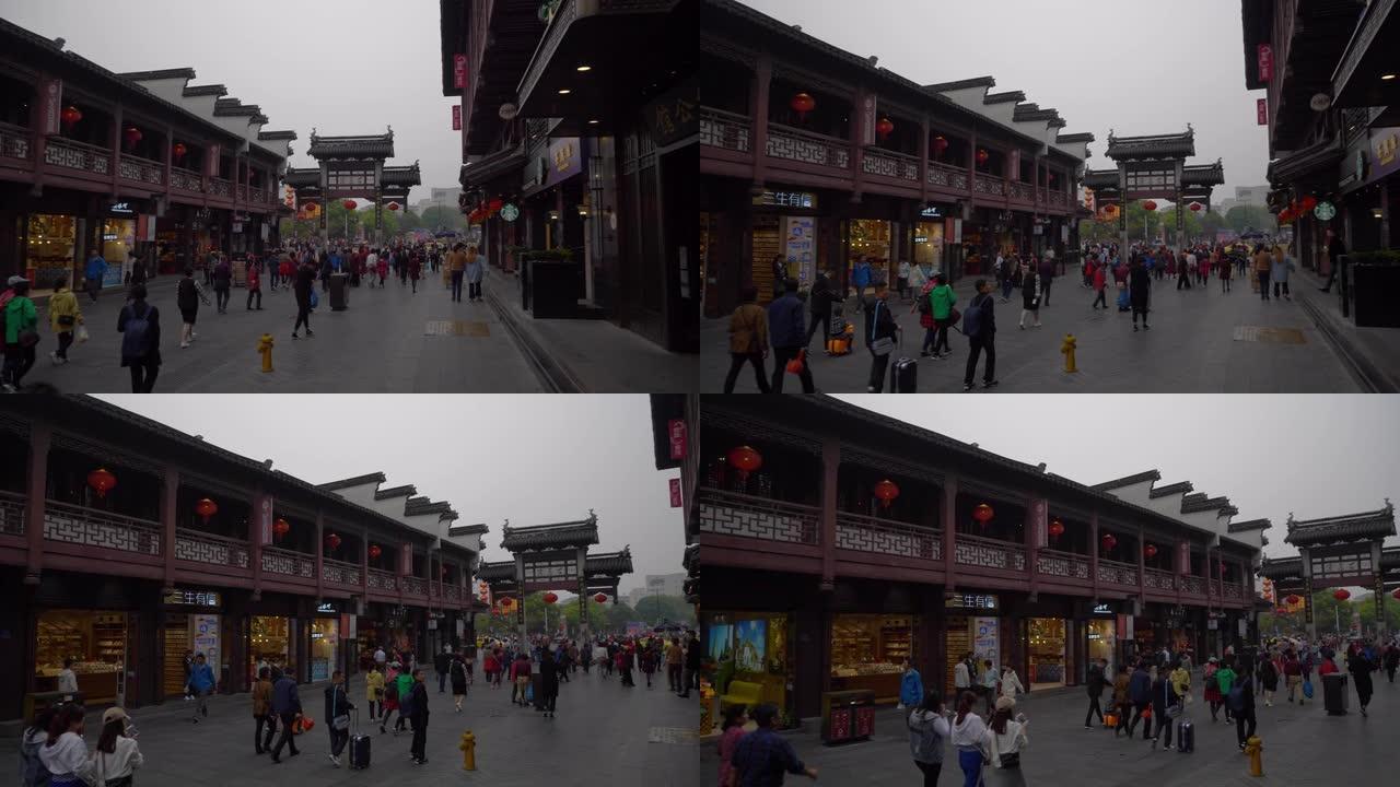 雨天南京城市旅游著名老城区拥挤街道慢动作全景4k中国
