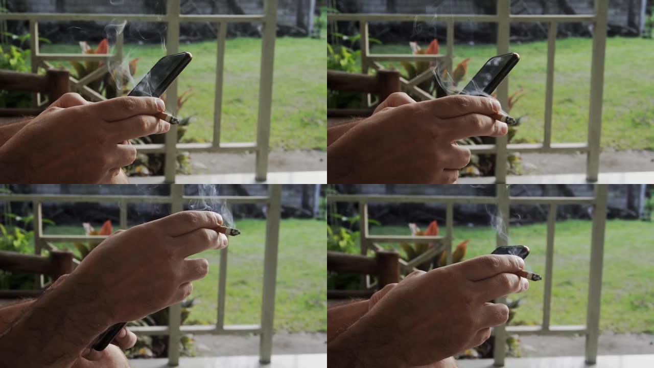 一名男子在智能手机上键入短信的特写镜头。