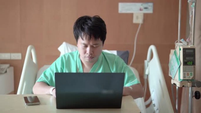 自由职业者亚洲病人在休息期间工作。