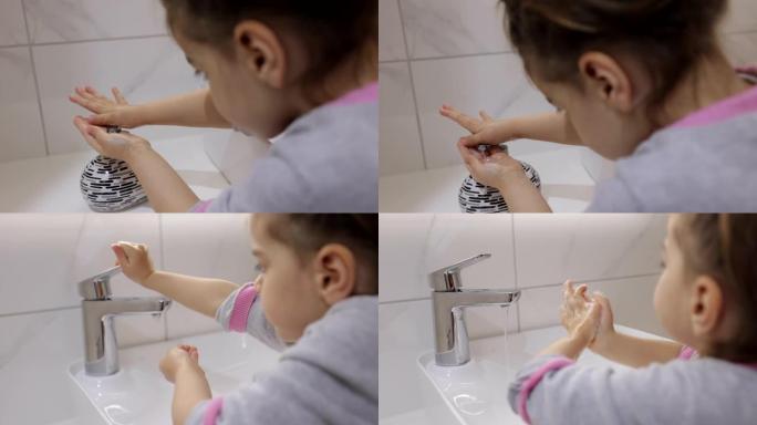 可爱的小女孩在家饭前洗手