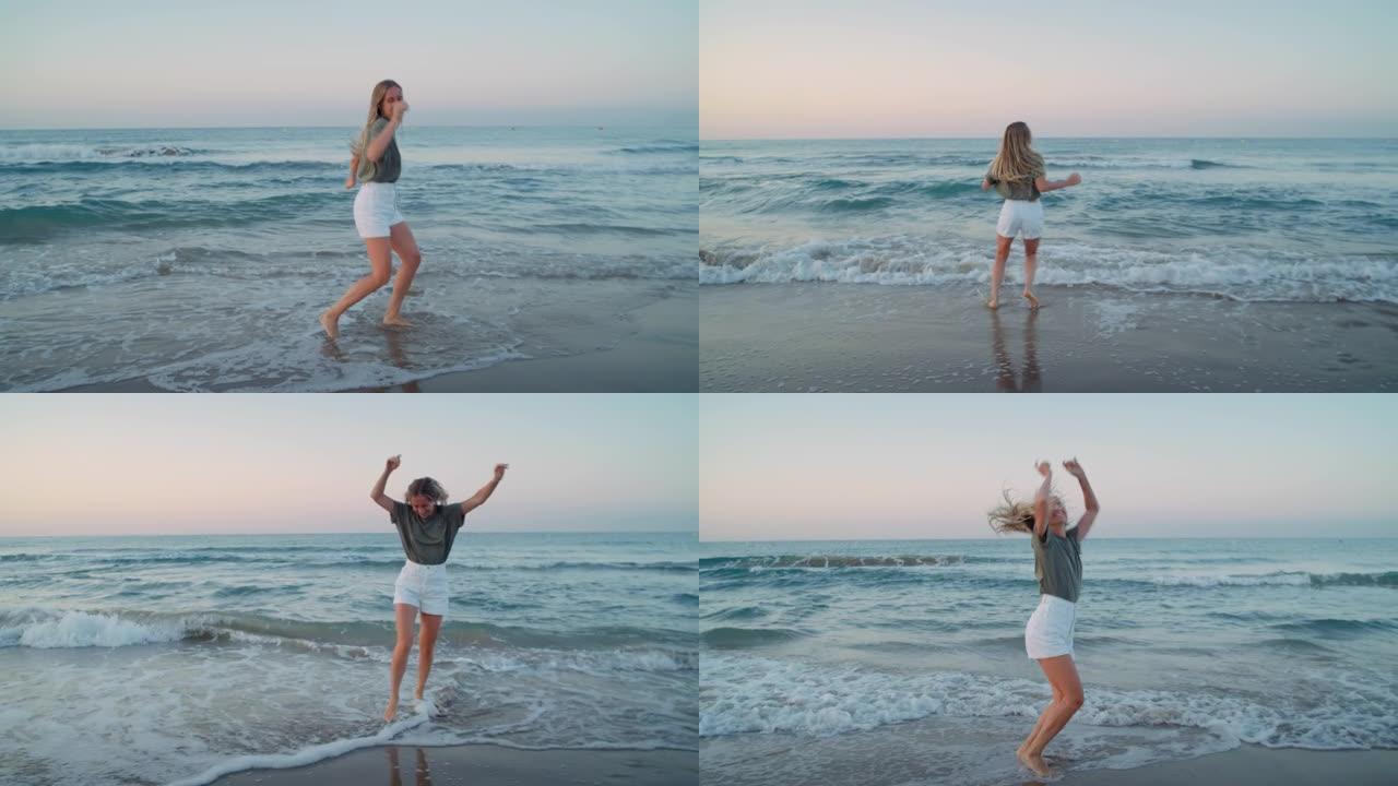 年轻女子在海滩波浪岸跳舞快乐