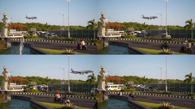 晴天巴厘岛机场区交通街圈飞机降落慢动作全景4k印度尼西亚
