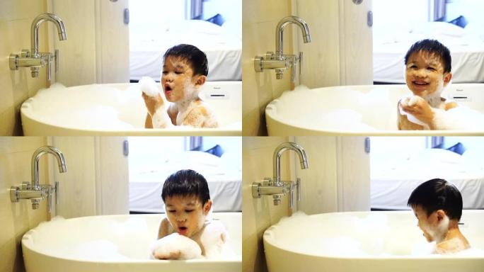 亚洲孩子在浴缸里玩得开心。健康和幸福的概念