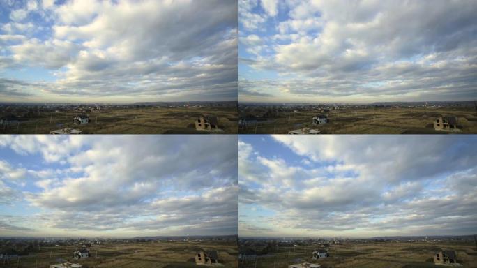 蓝天上快速移动的暴风云的延时镜头。