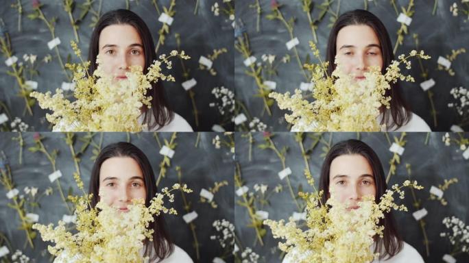 带有花束的年轻女士肖像如果草地花