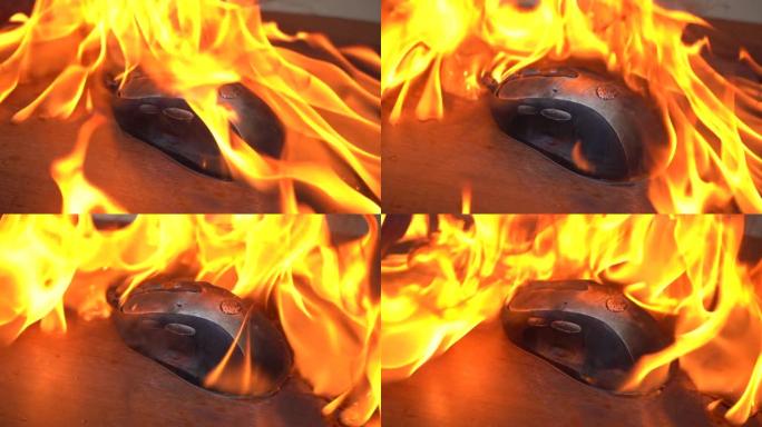 烧掉电脑鼠标。概念，计算机鼠标因过载和紧张工作而着火