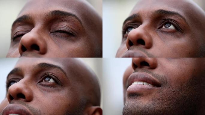 非洲男子睁开眼睛特写，黑人种族人士睁开眼睛