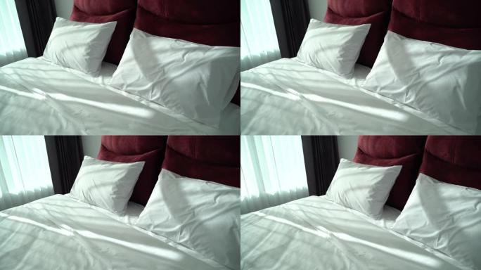 卧室酒店床上枕头的镜头