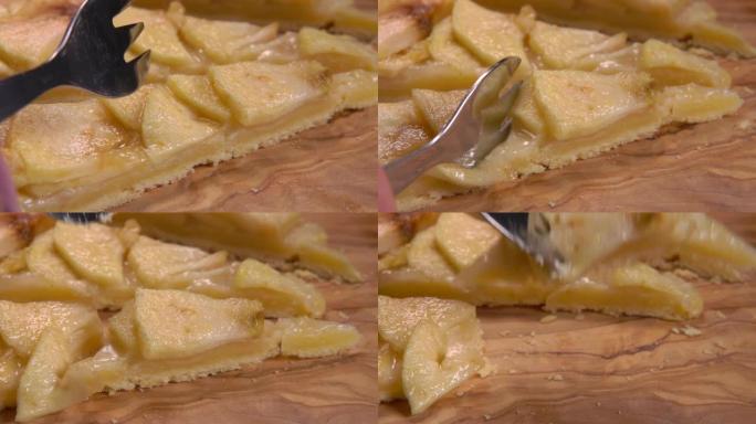 叉子切掉一块美味的自制法式苹果派
