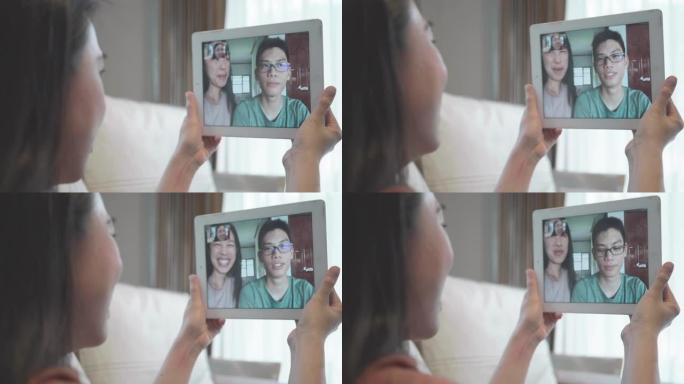 东南亚人在检疫期间与家人进行社交视频电话会议