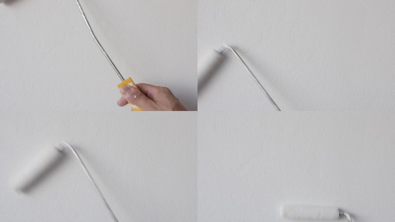 慢动作白色油漆在墙壁表面铺展，带滚轮慢动作视频