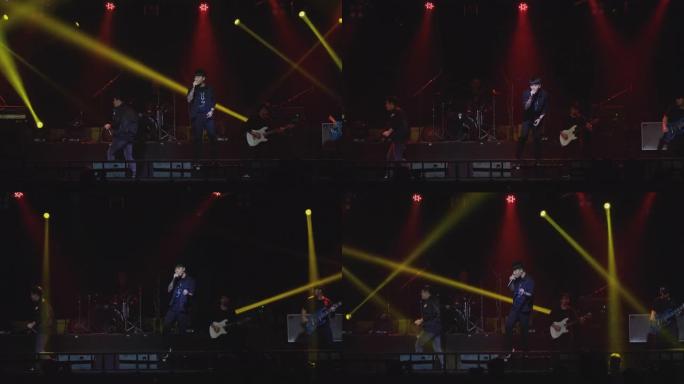 亚洲歌手表演与乐队在舞台上演唱不同颜色和风格的迪斯科灯光