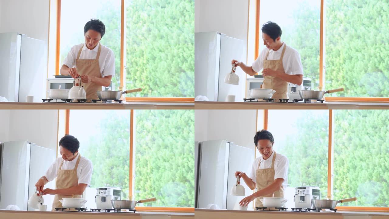亚洲男子在家做饭居家做饭的男人视频素材开