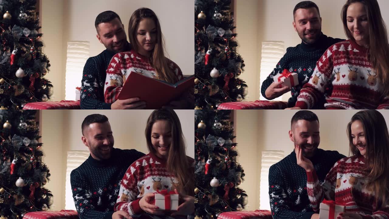 在圣诞节那天，一个男人在盒子里给他心爱的女人鞠躬致敬。