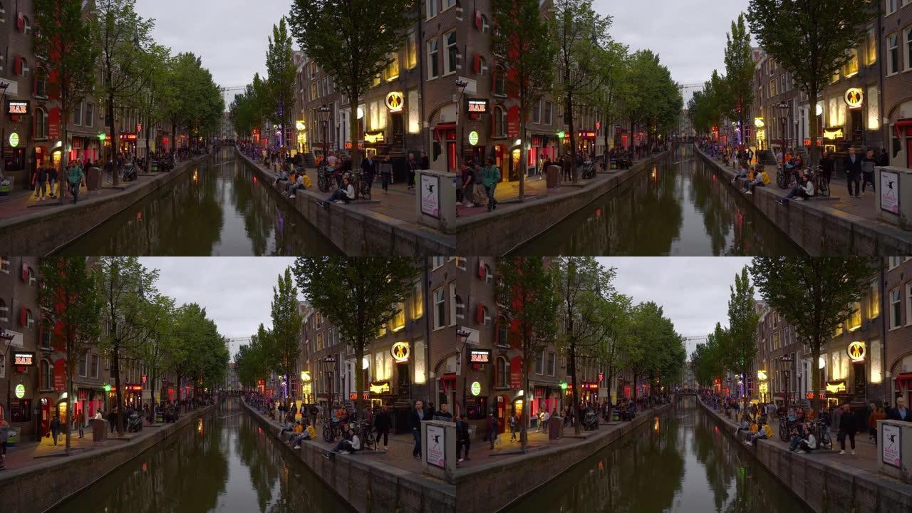 暮光之城照明阿姆斯特丹城市著名的红场运河拥挤全景4k荷兰