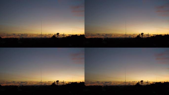 日落时间天空巴厘岛景观沙努尔地区酒店屋顶全景4k印度尼西亚