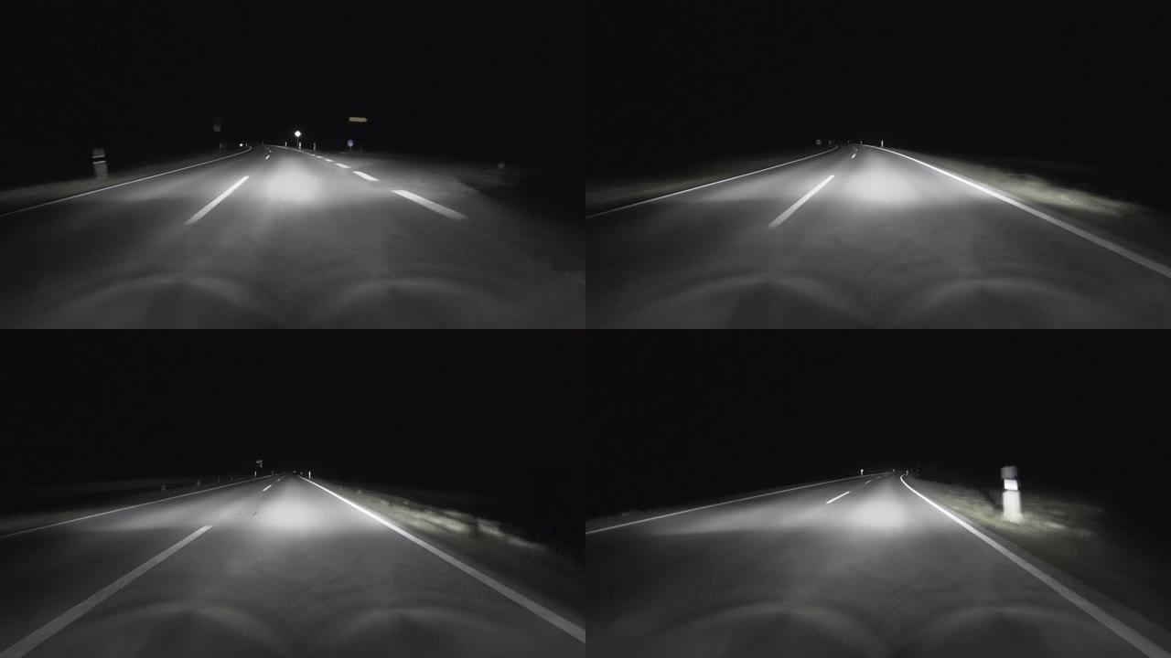 视点: 夜间在公路上行驶的汽车