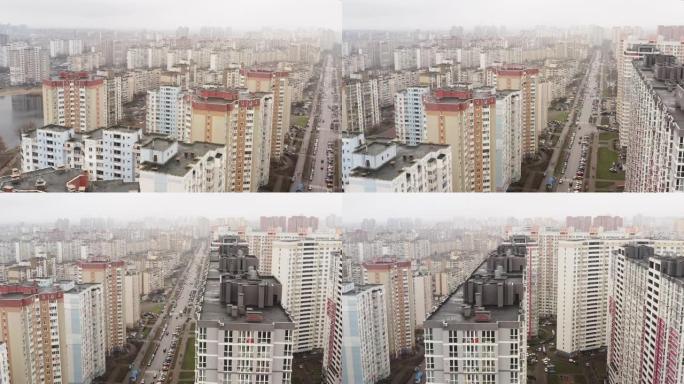 鸟瞰图。一个在阴天的冬日里有高层建筑和公寓的城市。基辅全景。大都市住宅区的多层建筑。城市化。城市总体