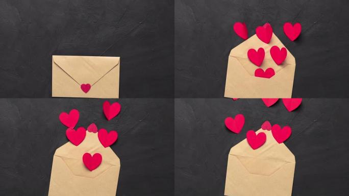 纸心从黑色背景上的信封中飞出。情人节概念。