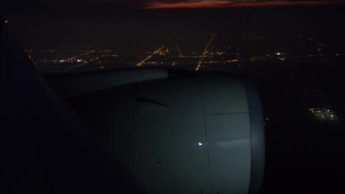 机场夜间飞行坐飞机拍摄机翼