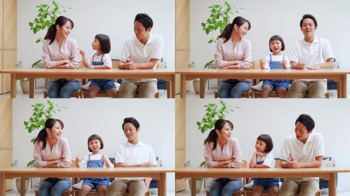 亚洲家庭在家聊天一家三口家庭教育脑筋急转