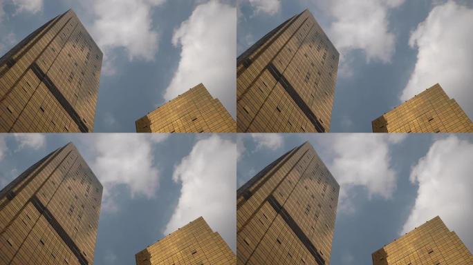 阳光明媚的日子广州市中心摩天大楼上视图慢动作全景4k中国
