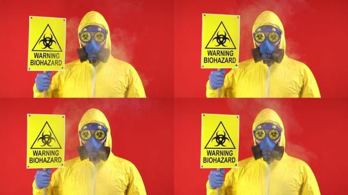 显示出警告生物危害的迹象。一个穿着黄色防护服，戴着横幅的防护面具的人。危害概念，生态问题。