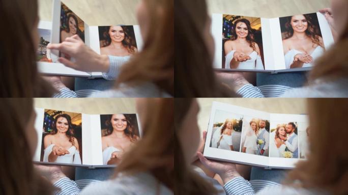 顶视图。妈妈和女儿叶子穿过婚礼写真集。