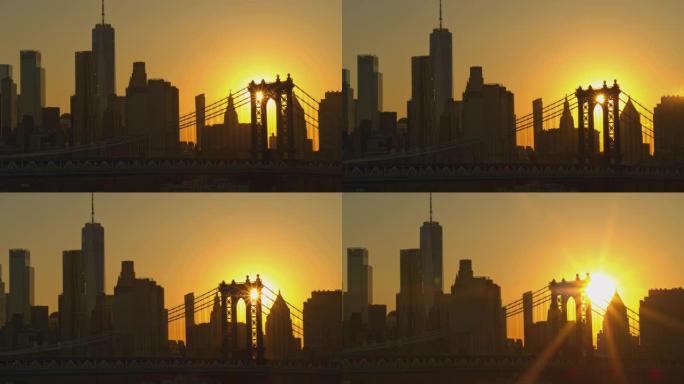 夕阳下曼哈顿大桥的剪影。平移摄像机运动的航拍录像。