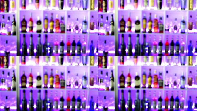 俱乐部酒吧架上充满酒精饮料的模糊充满活力的背景