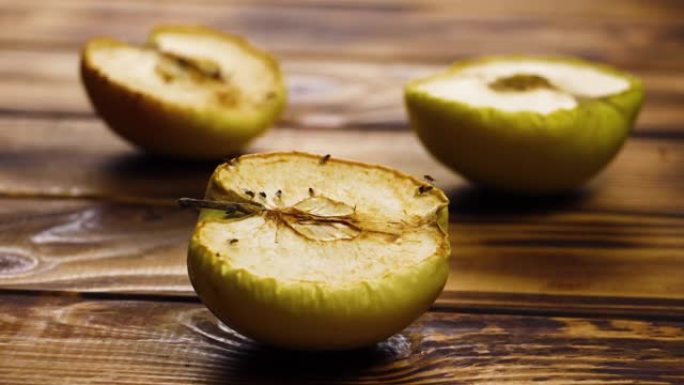 新鲜成熟的黄苹果腐烂过程，干燥，延时拍摄，产品生态腐烂，带虫变质收获
