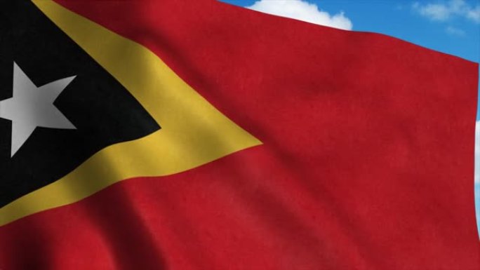 东帝汶国旗在风中飘扬，蓝天背景。4K