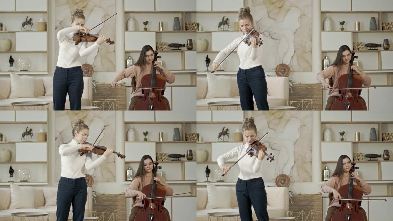 在豪华家居室内演奏小提琴和大提琴的女性弦乐二重奏