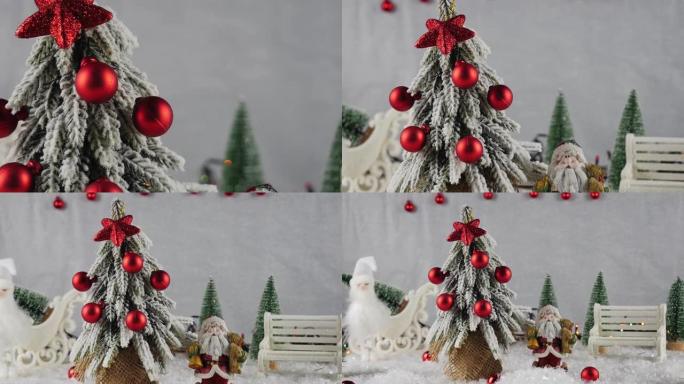 圣诞装饰品背景。散发圣诞精神和心情。绿树上装饰着红色的球。