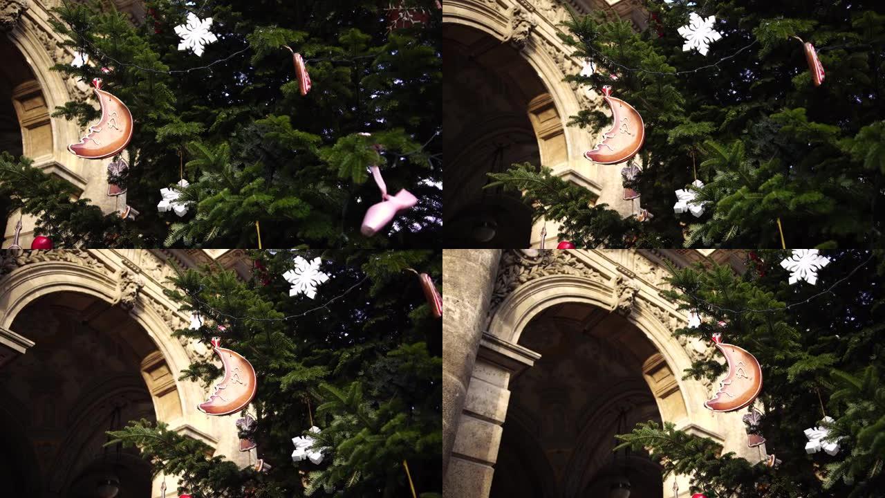 圣诞树树枝上的木制玩具，一个月的形状，六角星等。