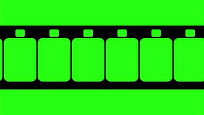 超级8毫米胶条移动在绿色背景。绿色屏幕上无缝循环的视频素材。