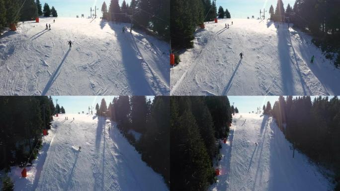 滑雪者在滑雪道上滑雪的鸟瞰图