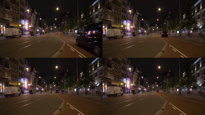 阿姆斯特丹市中心夜间照明著名交通街全景4k荷兰
