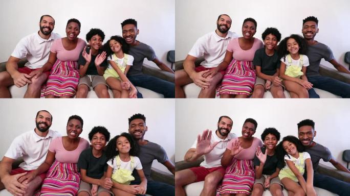 多元化的家庭向镜头打招呼，混合种族父母和孩子对镜头说话，远距离交流