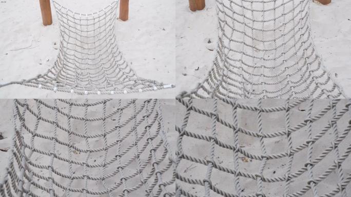 悬挂在爱沙尼亚岸边的电线杆上的白网
